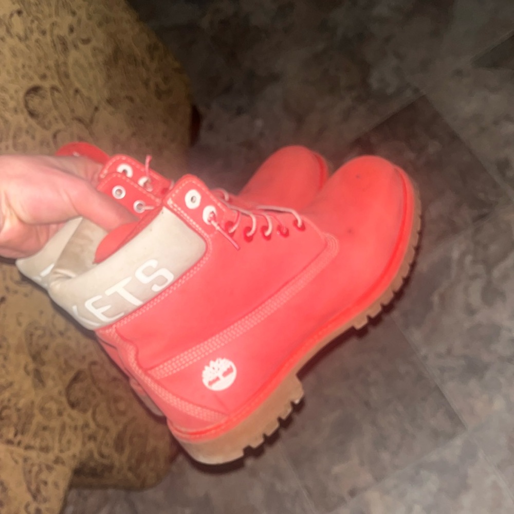 Houston rocket timberlands size 11 USED. Has a couple stains but easy to clean.